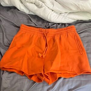 Aritzia orange fleece sweatshorts